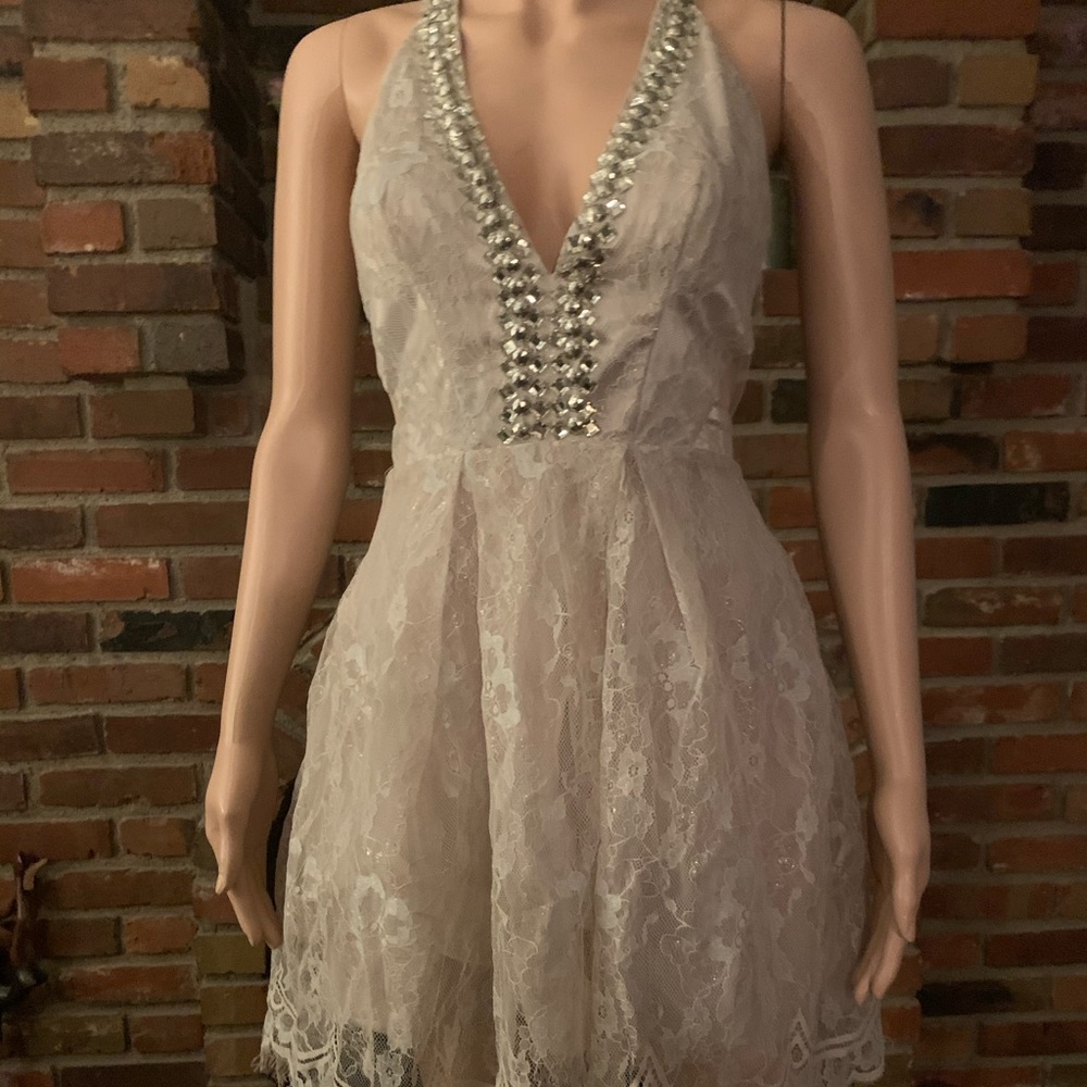 Champagne Bebe lace cocktail dress